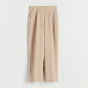 Reserved - Kalhoty s nažehlenými puky - Béžová